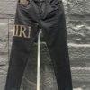 Amiri Logo Yellow Black Jeans