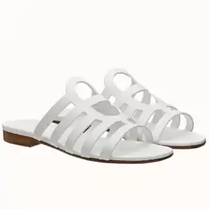 HERMES CAMELIA SLIDE SANDALS IN WHITE CALFSKIN - HMSD139