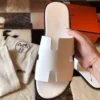 HERMES MEN'S IZMIR SANDALS IN WHITE EPSOM LEATHER - HMSD030