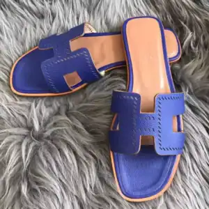 HERMES ORAN SLIDE SANDALS IN BLUE EPSOM PERFORATED CALFSKIN - HMSD095