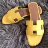 HERMES ORAN SLIDE SANDALS IN YELLOW SWIFT CALFSKIN - HMSD128