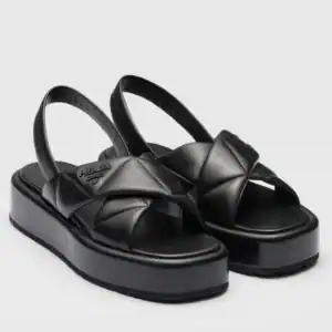 PRADA FLATFORM SANDALS IN BLACK QUILTED NAPPA LEATHER - PSD043