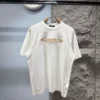 LOUIS VUITTON EMBELLISHED DAMIER PIQUE T-SHIRT - LVTS158